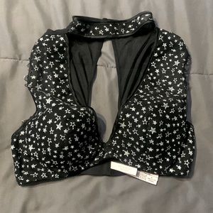 Star bralette with neck piece and ruffle shoulders.